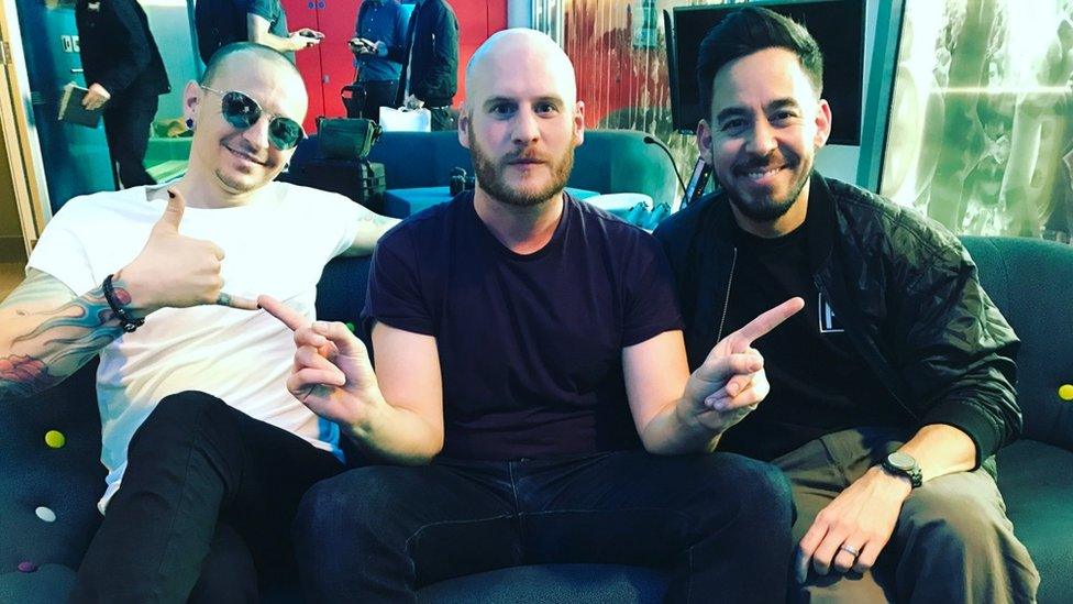 Chester (l) with Newsbeat music reporter Steve Holden and band mate Mike Shinoda