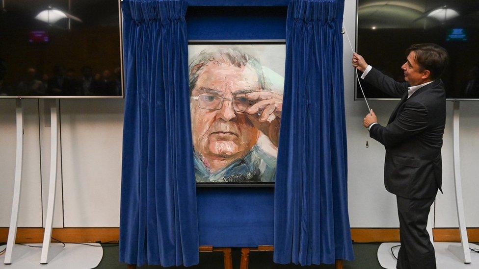 John Hume Jr unveils portrait of his father John Hume in parliament