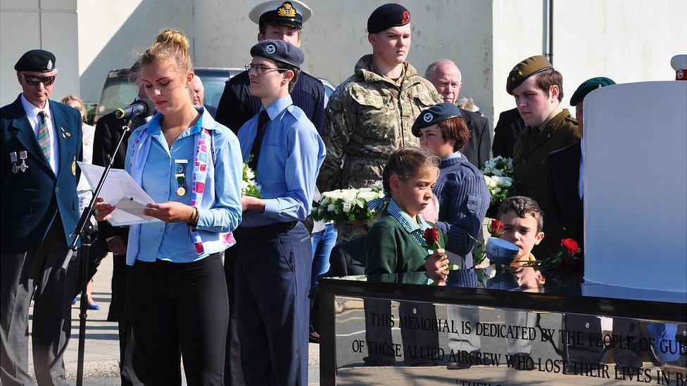 Allied Aircrew Memorial dedication ceremony - Flowers laid and the names of those remembered on the memorial read out