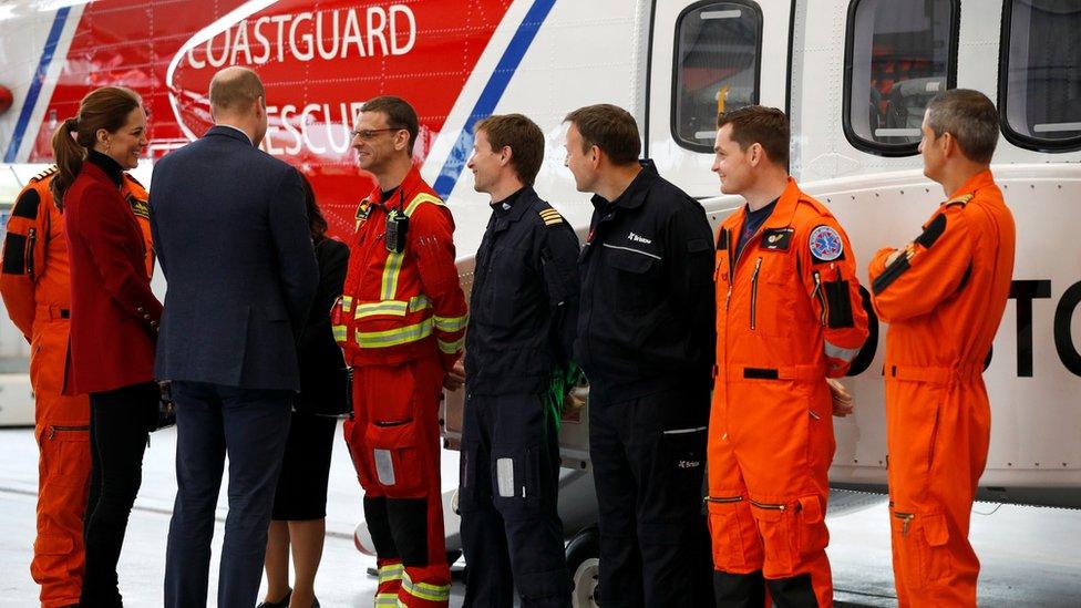 Duchess and Duke of Cambridge with search and rescue staff