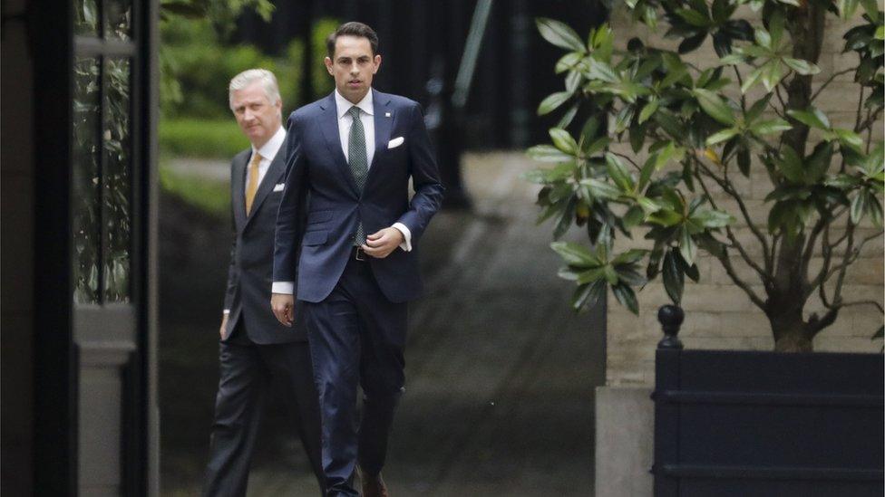 King Philippe of Belgium (left) welcomes chairman of Vlaams Belang party Tom Van Grieken (right) ahead of a meeting at the Royal Palace