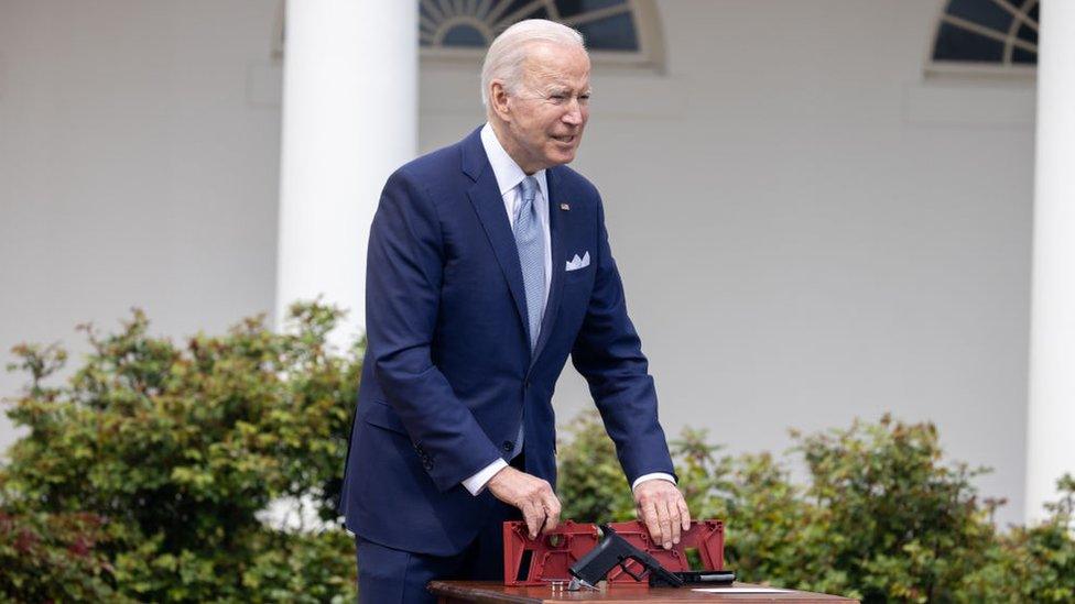 President Biden with a 'ghost gun' kit display in April 2022 at the White HOuse