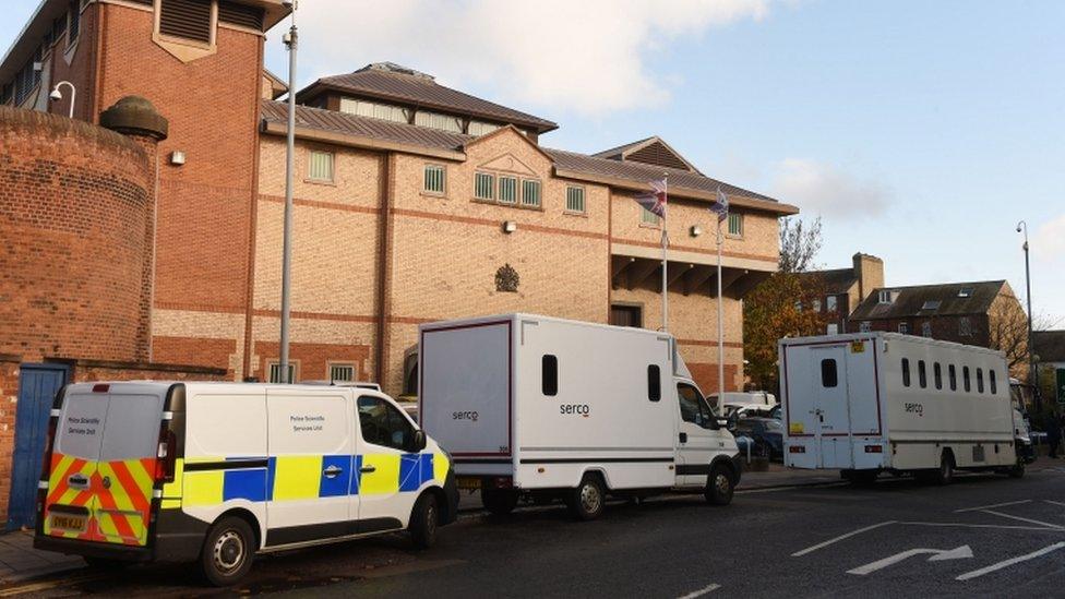 HMP Bedford with a police van outside