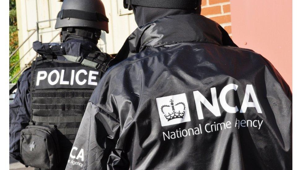 National Crime Agency officers