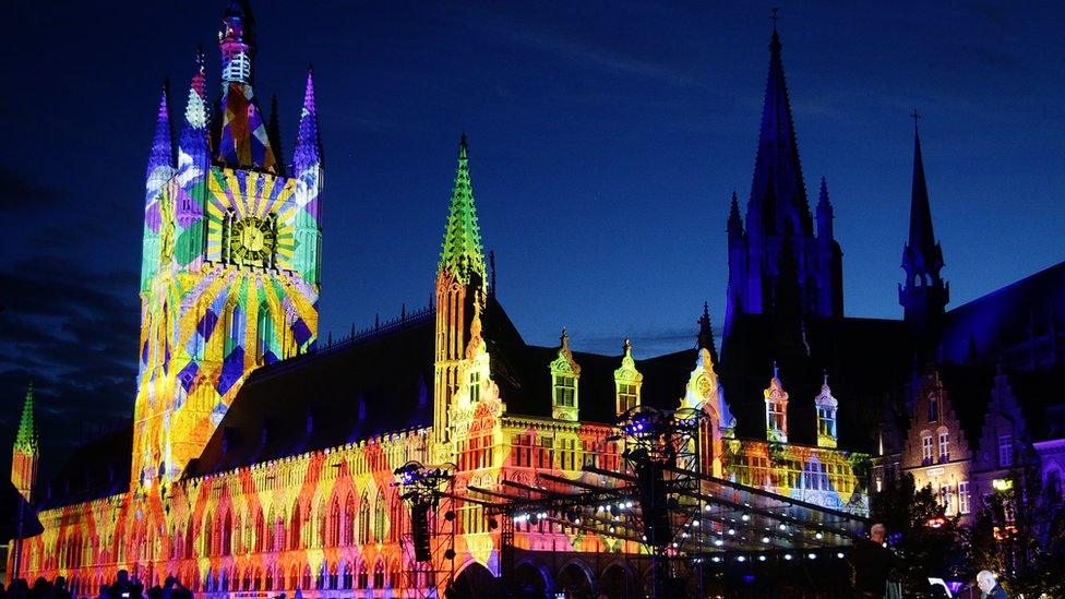 Stories from the battle were projected onto the outside of Cloth Hall on Sunday evening