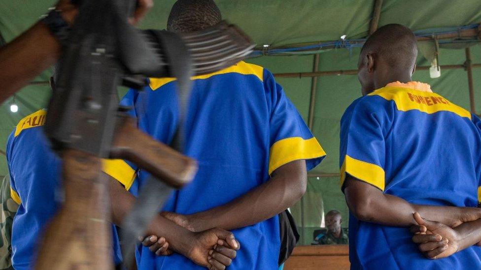 Defendants stand during the sentencing for the killing of Ambassador Luca Attanasio at the military prison of Ndolo, Kinshasa - 7 April 2023