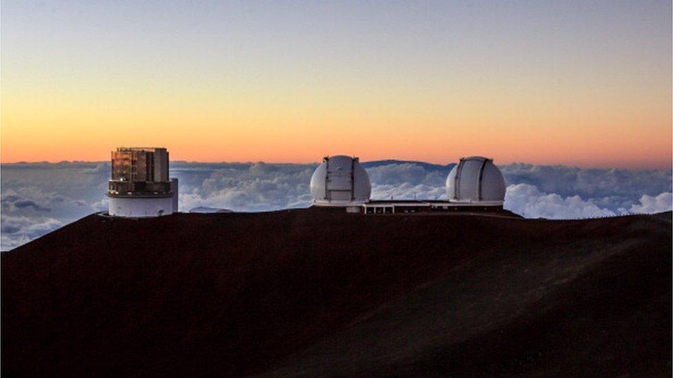 The Subaru, Keck I and Keck II Telescopes at the Mauna Kea Observatories at Sunset on the Big Island of Hawaii