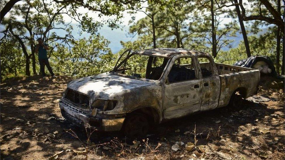 A burned truck is pictured at the Comedero Colorado ranch, in the municipality of Tamazula, Durango State, on 18 October 2015.