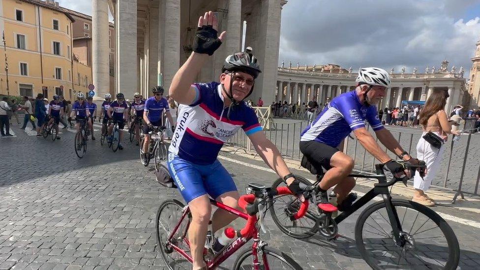 Cyclists leaving the Vatican