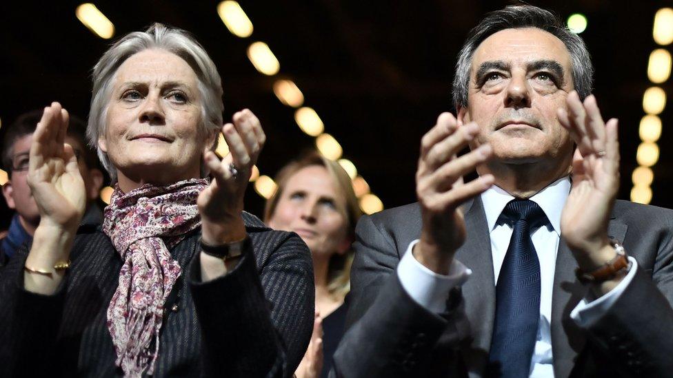 French presidential candidate Francois Fillon (right) and his wife Penelope attend a campaign rally in Paris, 25 November 2016