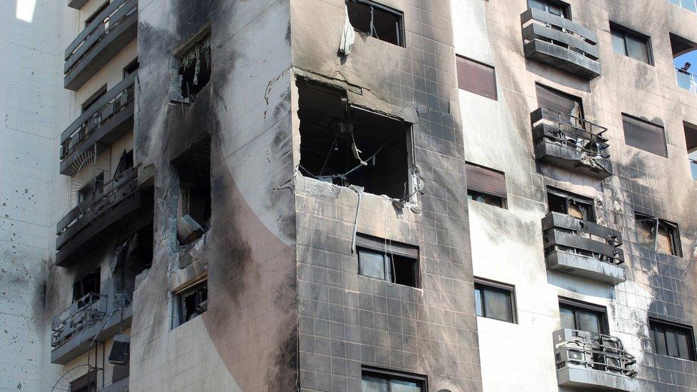 Damaged residential building in Kafr Sousa, Damascus, after what Syrian authorities said was an Israeli missile strike (21 February 2024)