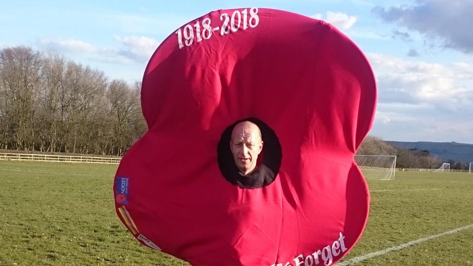 Owen Willis wearing poppy suit