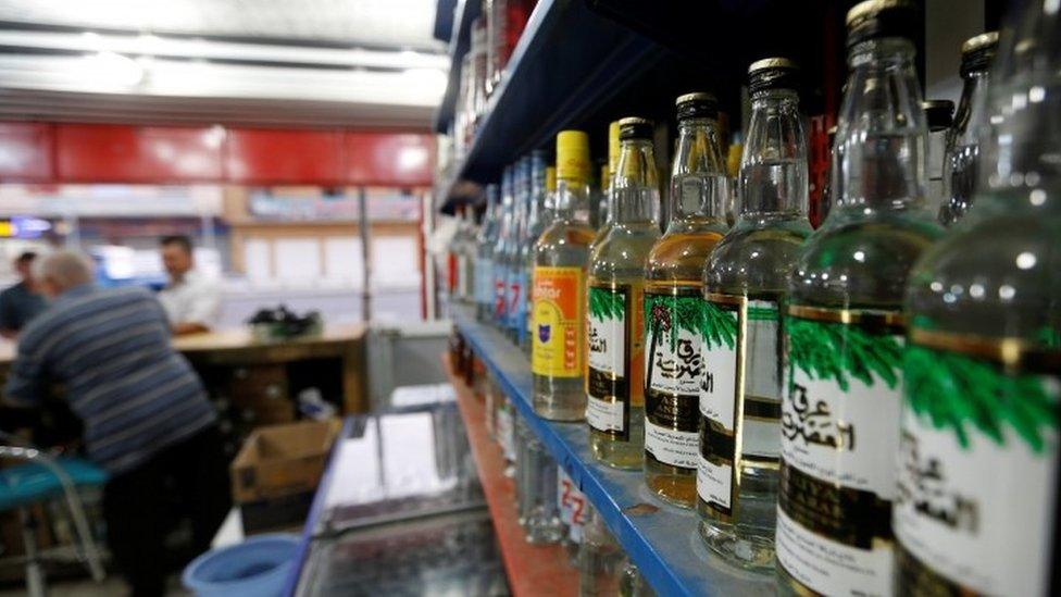 Bottles of alcohol at a wine shop in Baghdad (24 August 2016)