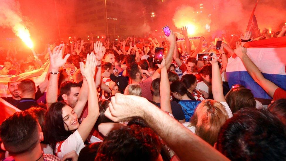 Croatian fans in the capital Zaghreb celebrate their team's victory against Russia in the World cup quarter finals