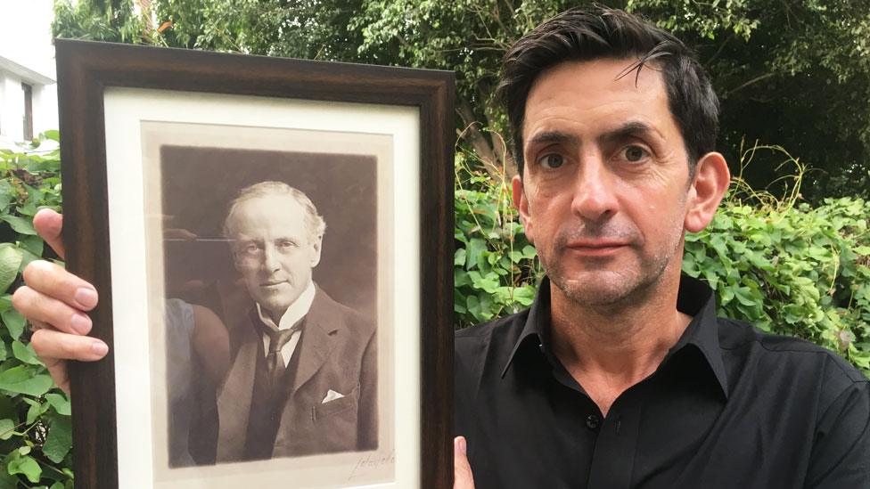 Justin Rowlatt holds a picture of his great-grandfather Sidney Rowlatt