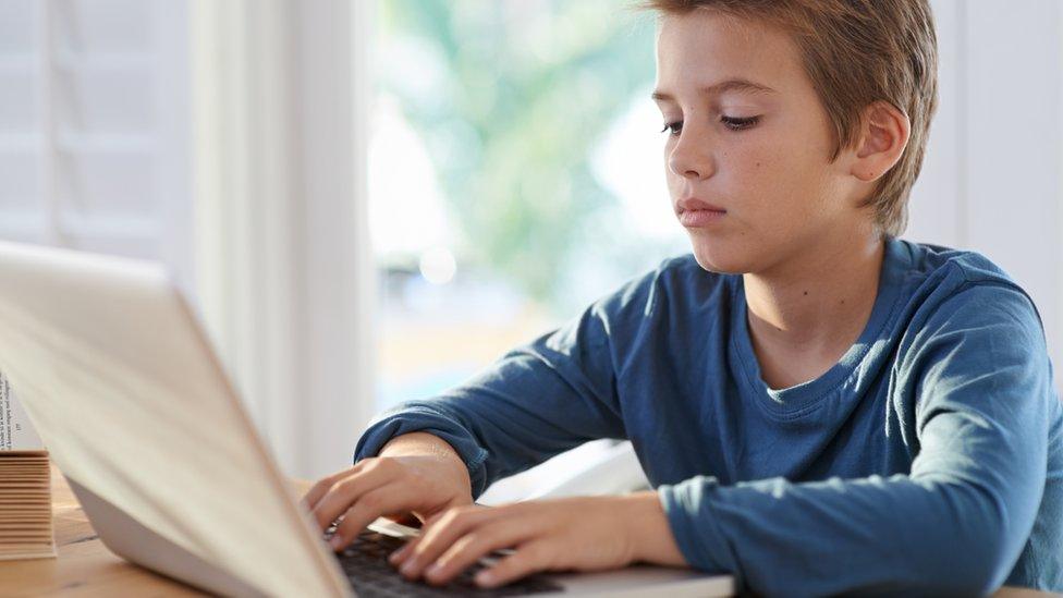 Boy on computer