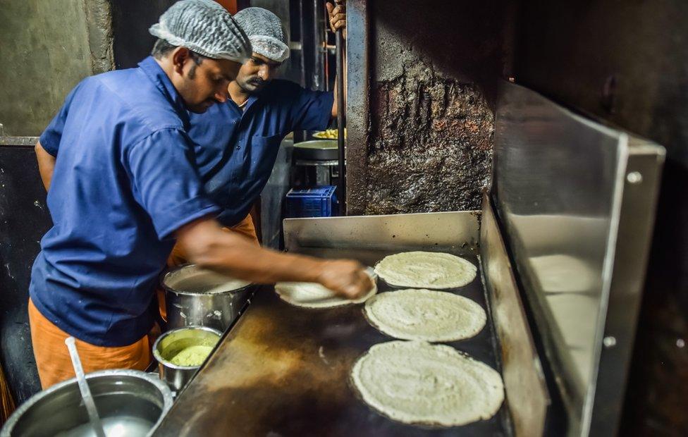 Dosa being made