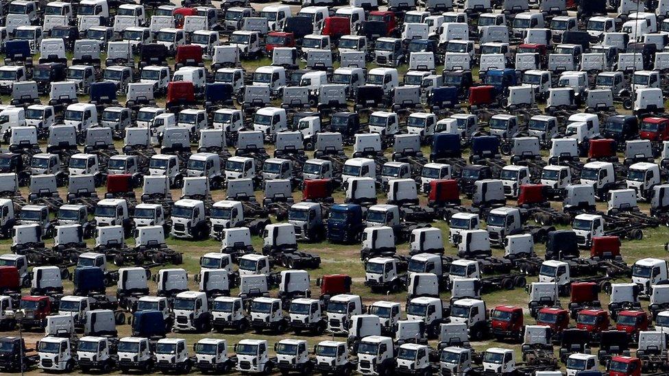 New Ford trucks are seen at a parking lot of the Ford factory in Sao Bernardo do Campo, Brazil, February 12, 2015.