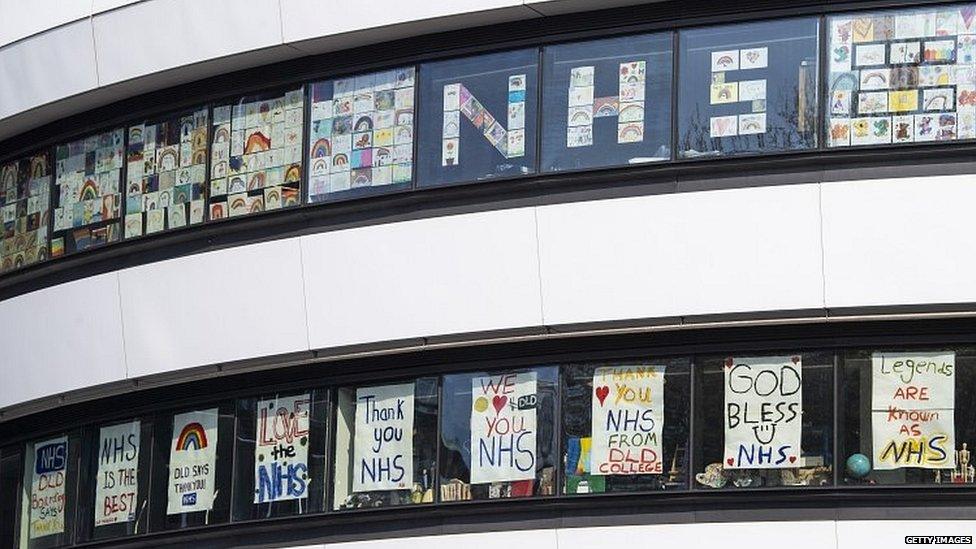 Posters in building near St Thomas' Hospital in central London