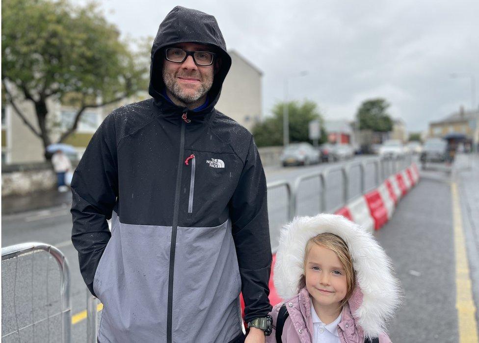 Father Paul Lumsden with his daughter in Paisley