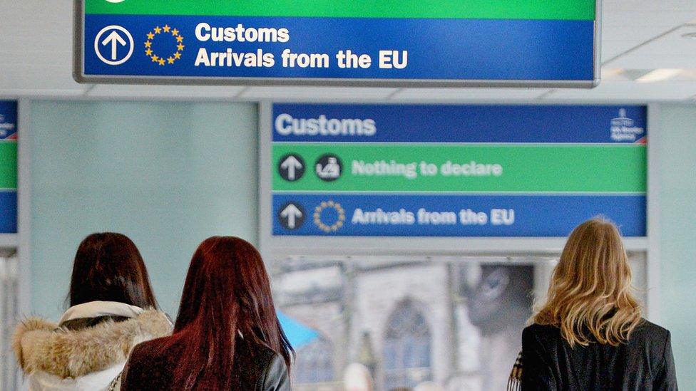 Immigration and border control signs at Edinburgh Airport on February 10, 2014 in Edinburgh, Scotland.