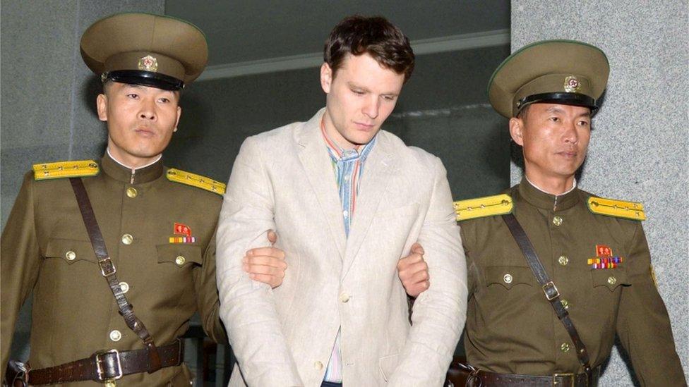 US student Otto Warmbier is marched into court by two North Korean guards (March 2016)