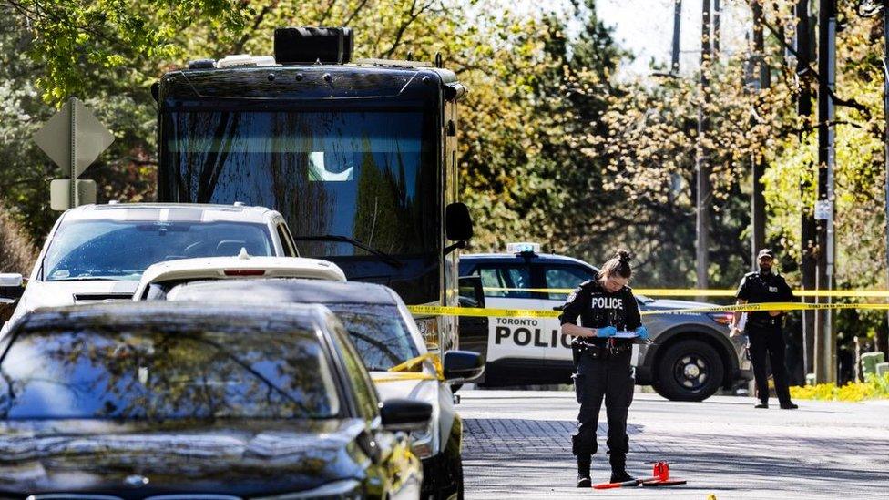 Toronto Police are seen outside Drake's mansion