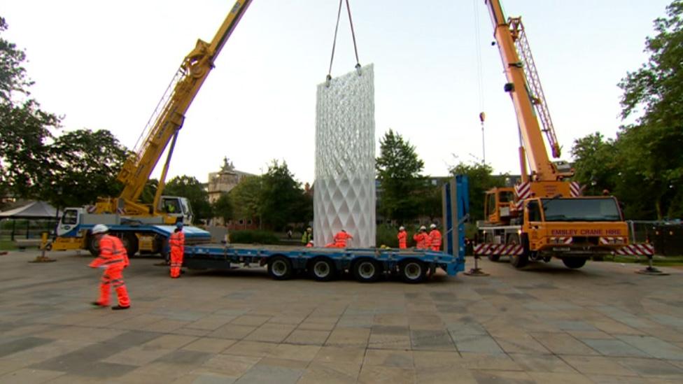 Sculpture being installed