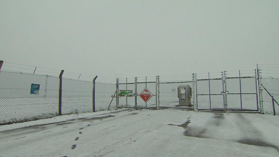 Snow by the gates of East Midlands Airport