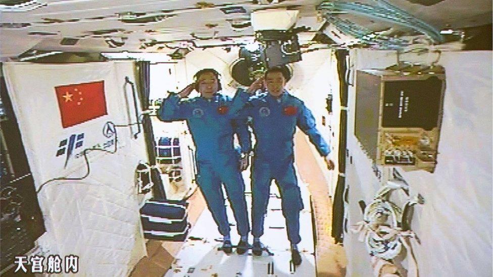 Chinese astronauts on board China's space station Tiangong 2 on 19 October 2016.