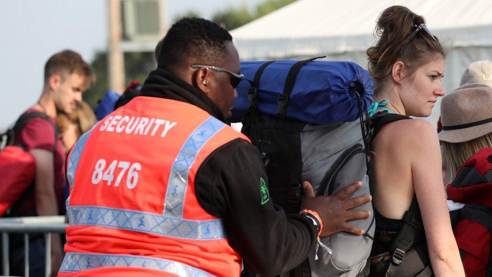 Woman being searched