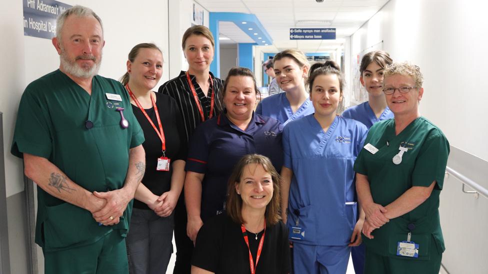 Red Cross volunteers and staff with clinical staff at Glan Clwyd Hospital