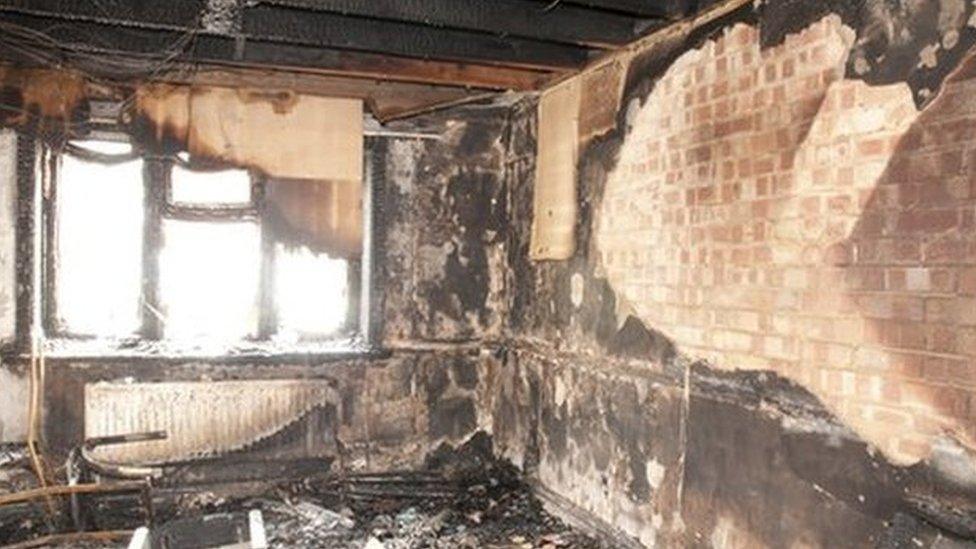 The lounge of the Shakoor family home after the fire