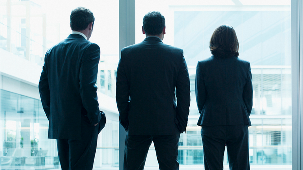 People standing in an office