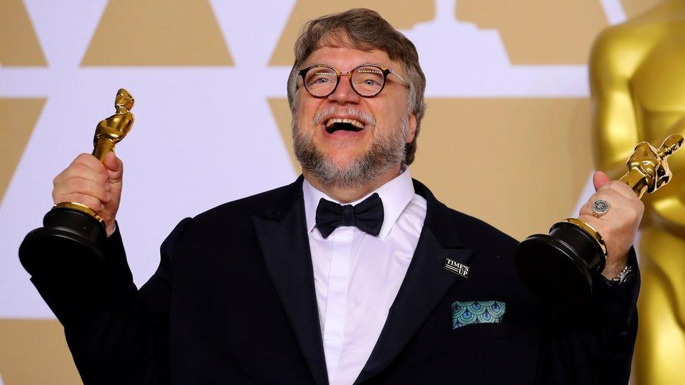 Guillermo del Toro with the Best Director Award and the Best Picture Award for "The Shape of Water" on 4 March 2018