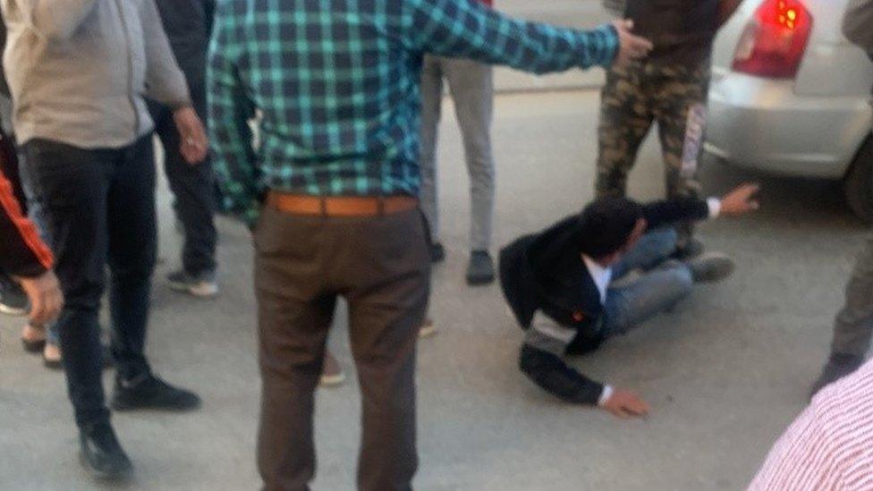 Still from video showing Ammar Mefleh wounded on the ground