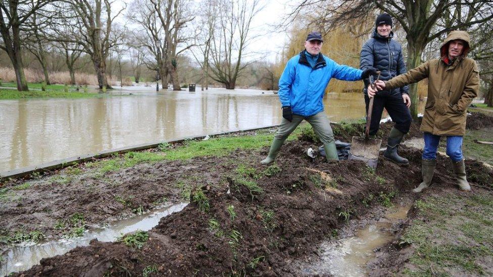 Gary Huntley, Franco Felice and Adrian Coleman, who dug a trench alongside the river