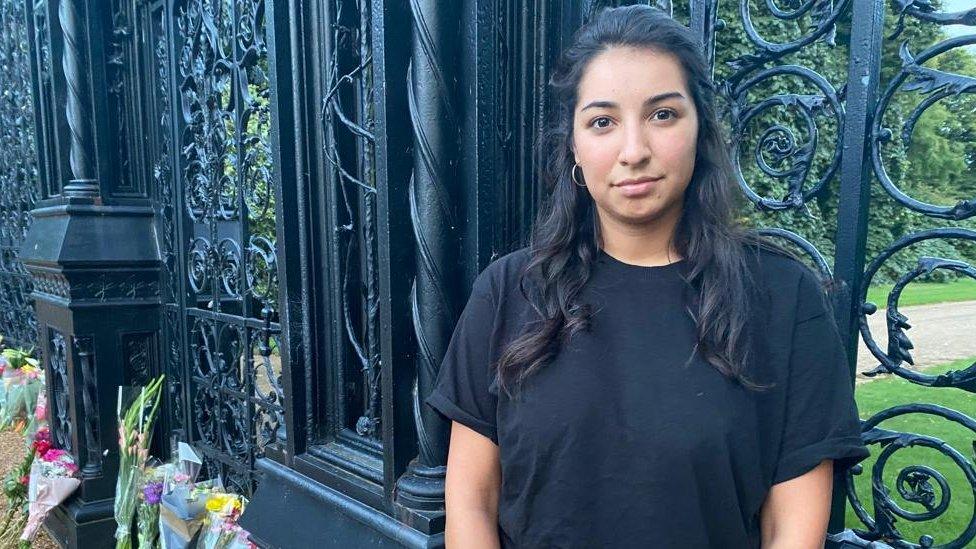 Jasmine Finbow laid flowers and crads from her family otside the gates of Sandringham