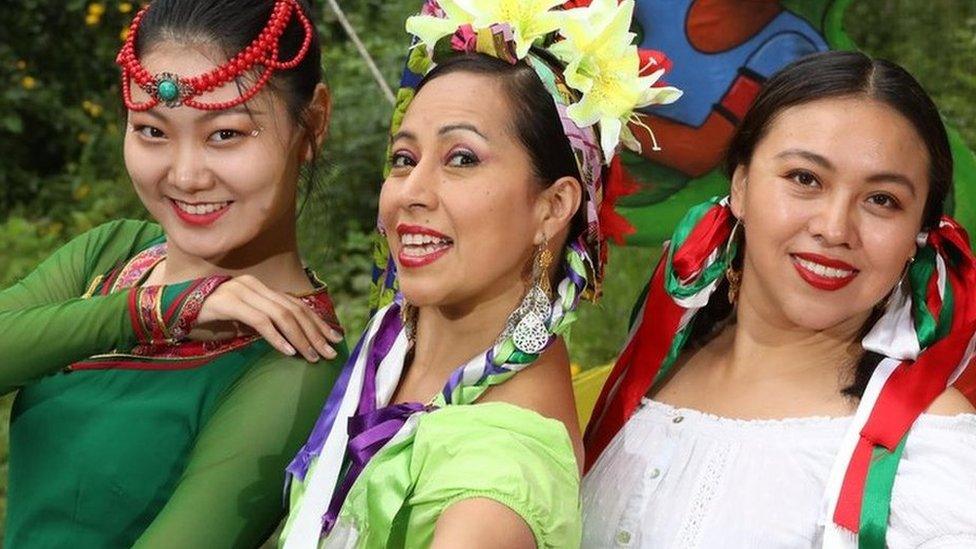 From left, Kancy Guan, classical Chinese dancer, and Mexican dancers Mayte Segura and Denise Navarrete at the launch of the Belfast Mela