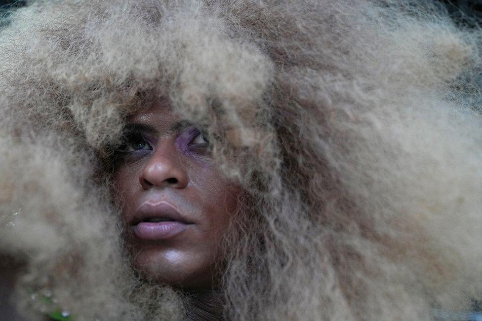 A performer poses for a photo during a march to advocate for LGBT+ community rights and against discrimination in Rio de Janeiro, Saturday, Jan. 25, 2025. 