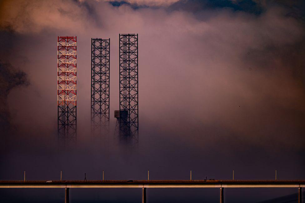 Tay Bridge and a drilling rig in mist.