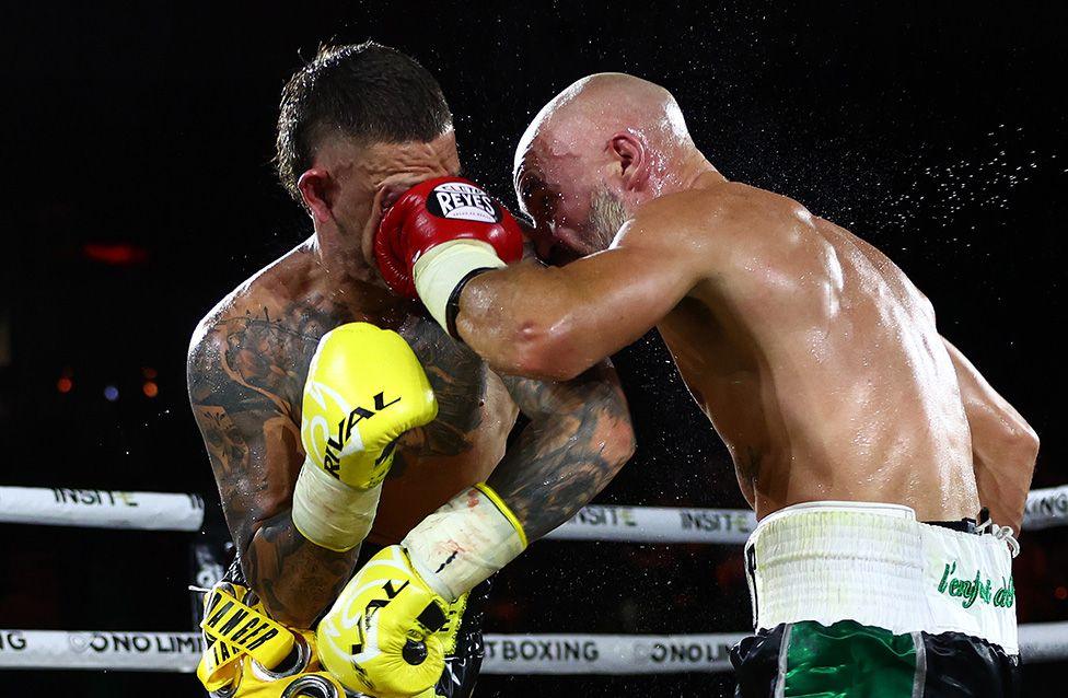 David Papot punches Liam Paro during the IBF welterweight world title eliminator bout at Pat Rafter Arena in Brisbane