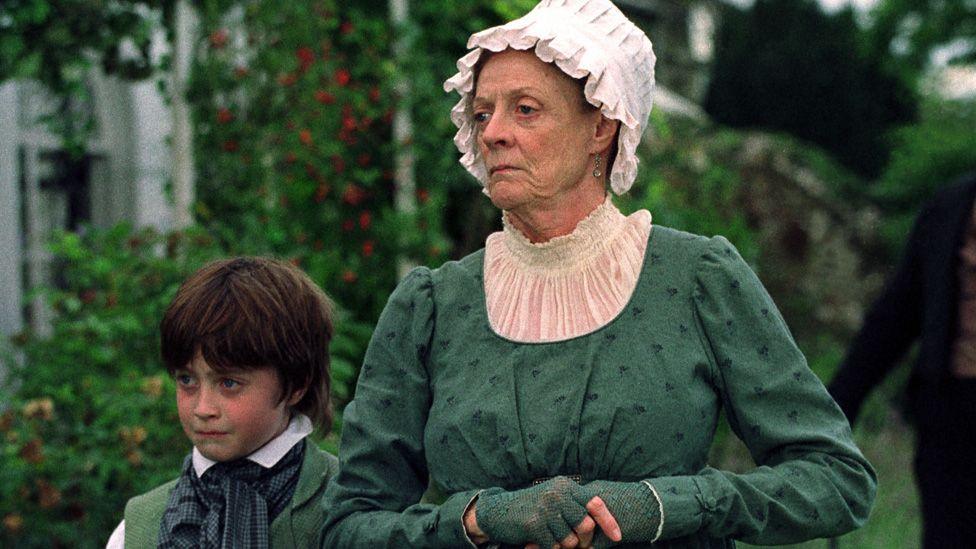 Dame Maggie Smith with a young Daniel Radcliffe in David Copperfield