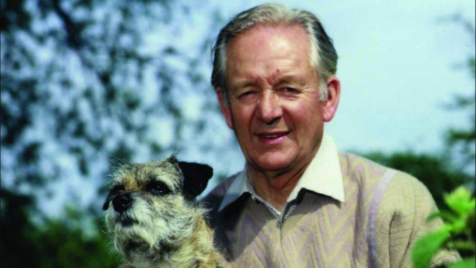 Peter Alf Wight pictured with his pet dog