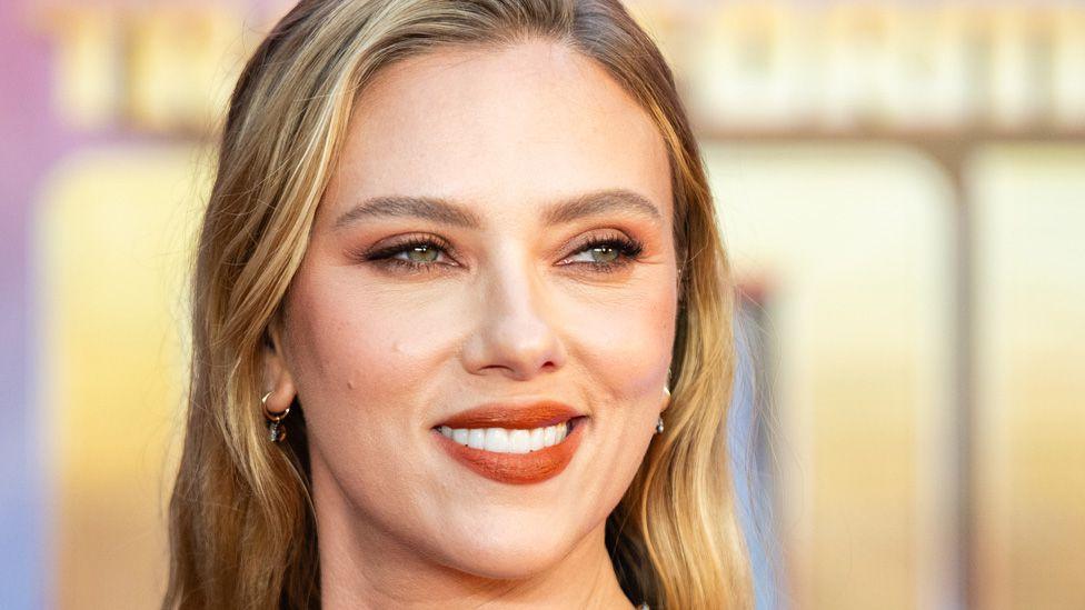 Scarlett Johansson smiling at a premiere