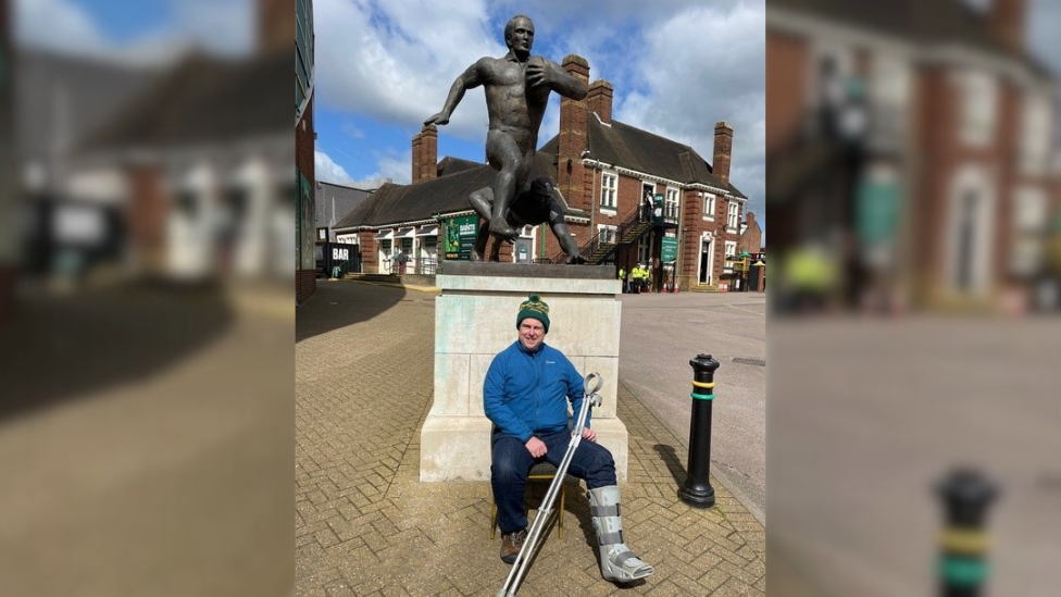 Phil outside Franklins Garden waiting for friends to arrive at the end of a charity walk for Macmillan Cancer Support in April