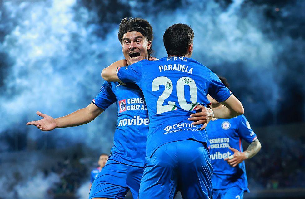 Jose Paradela celebrates scoring Cruz Azul's third goal with team-mate Luka Romero at the Torneo Apertura in Mexico City