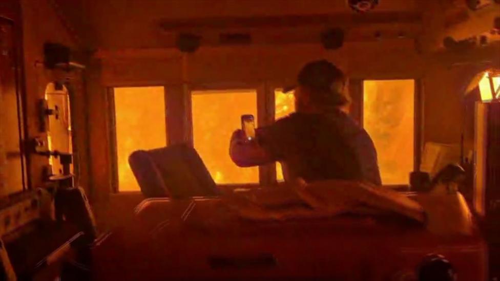 Train 'encased in flames' in Canada wildfire