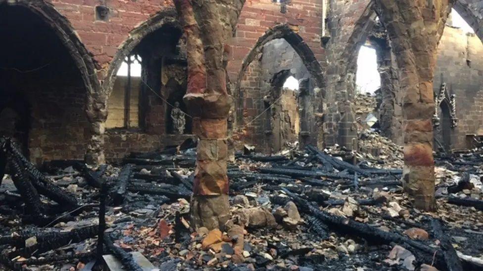 All Saints' Church in Derbyshire after it was set on fire by an arsonist.