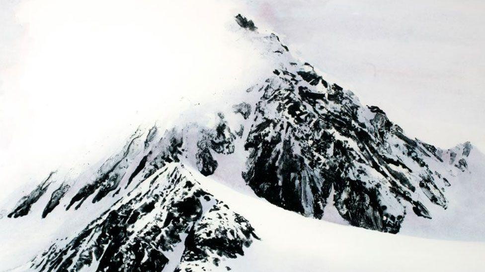 Emma Stibbon's Ice Cloud, Antarctica, 2019. Print on paper, showing a black jagged rock emerging out of deep white snow against a white background